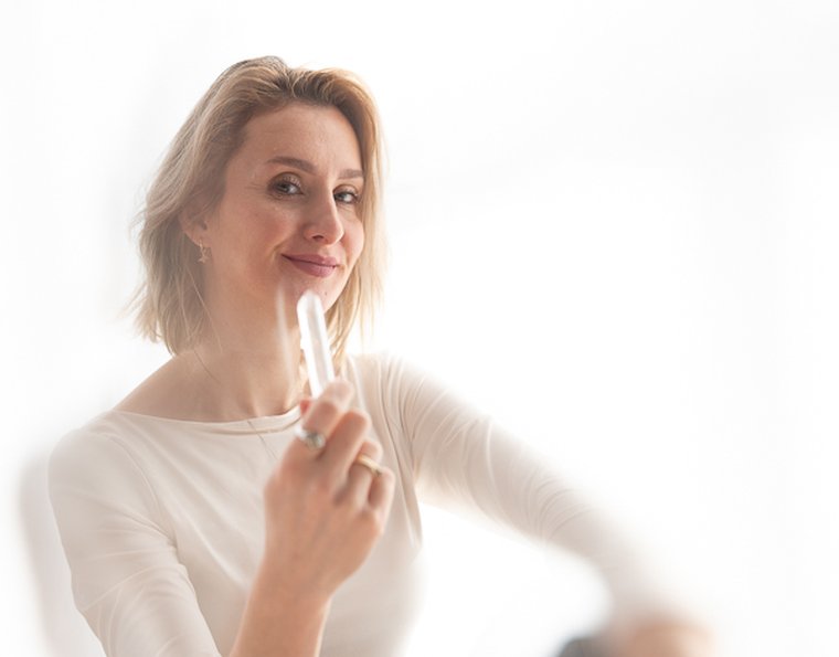 Jennifer holding a crystal